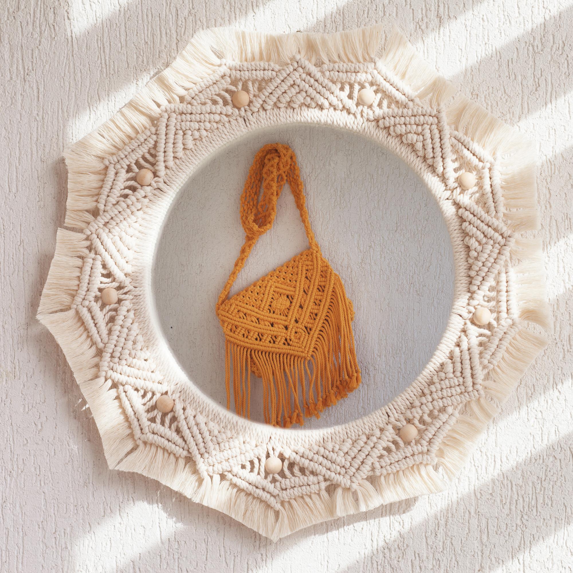 embroidered linen cushion with subtle geometric motif
